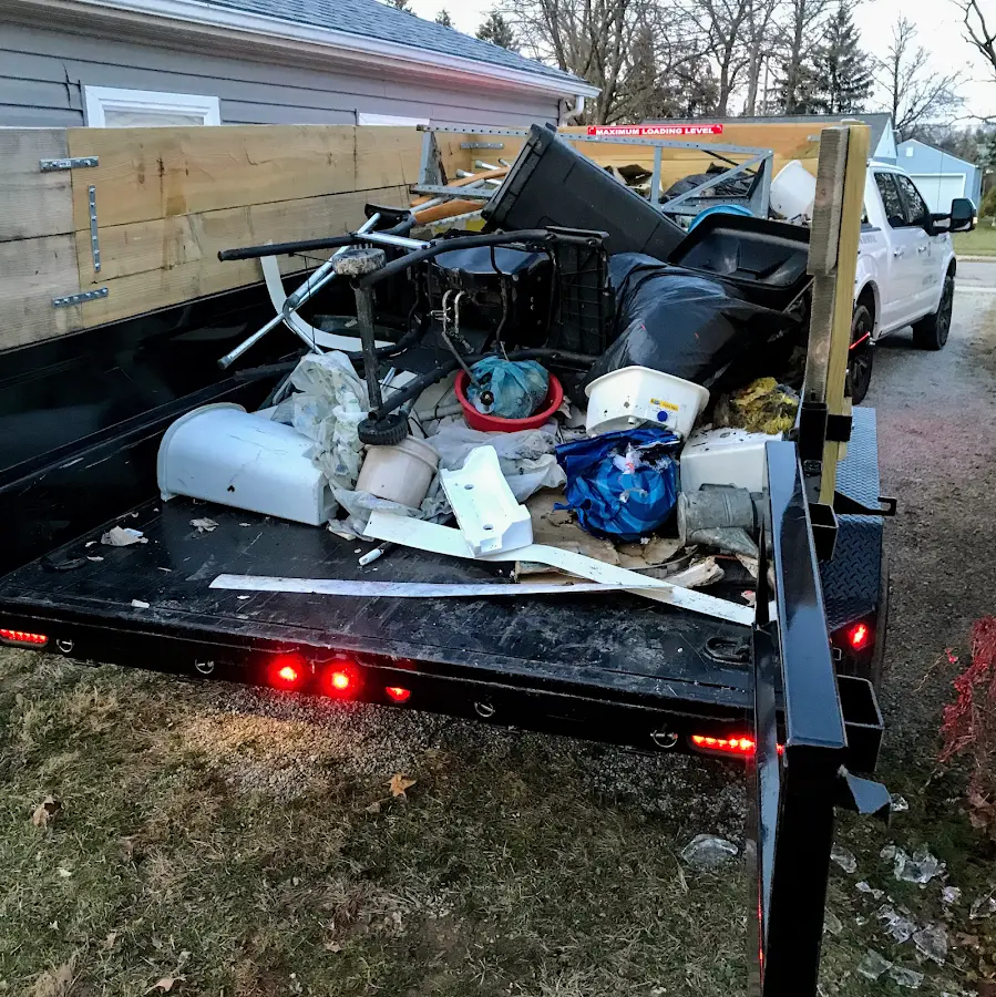 Roll-off dumpster delivered to a residential driveway in Arundel