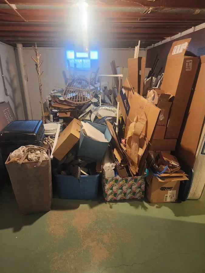 Roll-off dumpster container at job site for Construction Dumpster Rental in Arundel